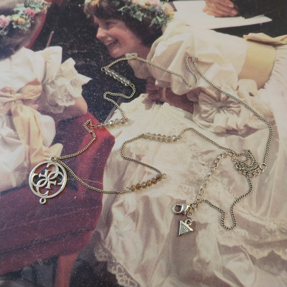 Guess Gold and Crystal Pendant Necklace - Picture 12 of 13